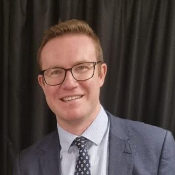 Portrait of Tim Roca MP